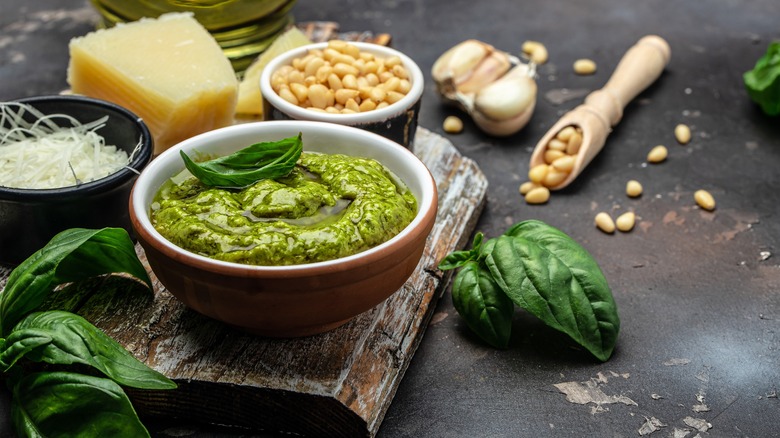 Homemade pesto sauce and ingredients