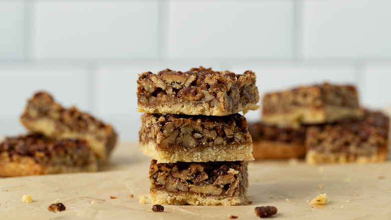 Pecan pie bars in a stack
