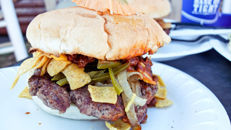 Burger stacked with Frito Corn Chips