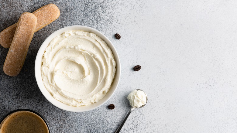 bowl of ricotta cheese with sweet ingredients