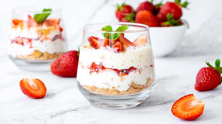 yogurt parfait with strawberries and cake