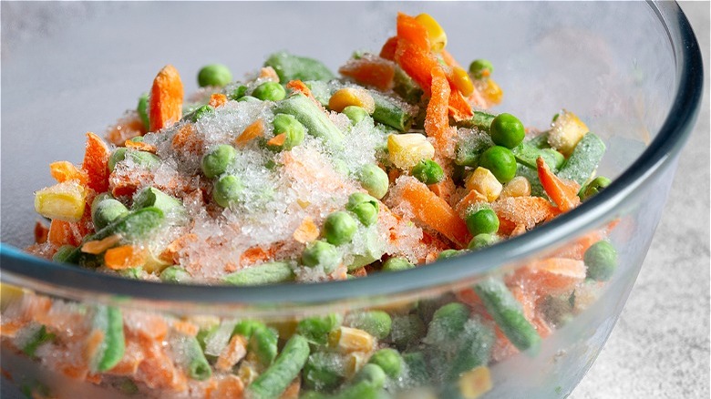 Clear bowl of frozen vegetables