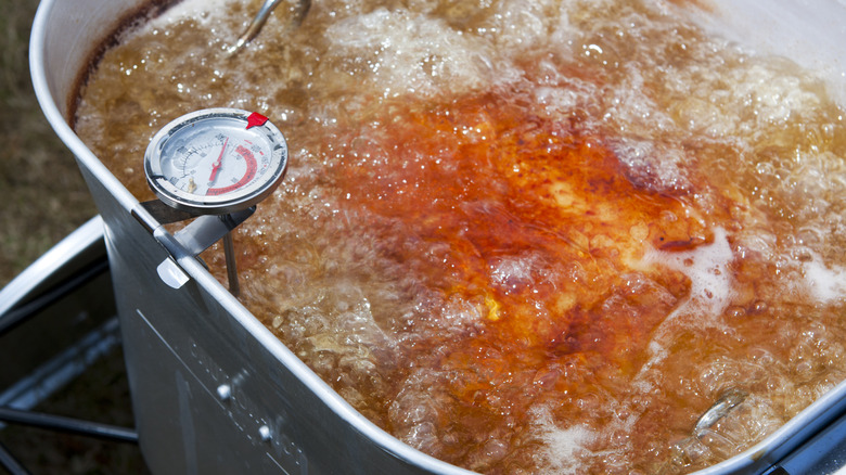 Chicken frying in oil