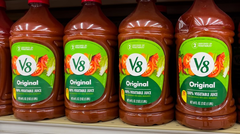 Bottles of V8 vegetable juice in grocery store