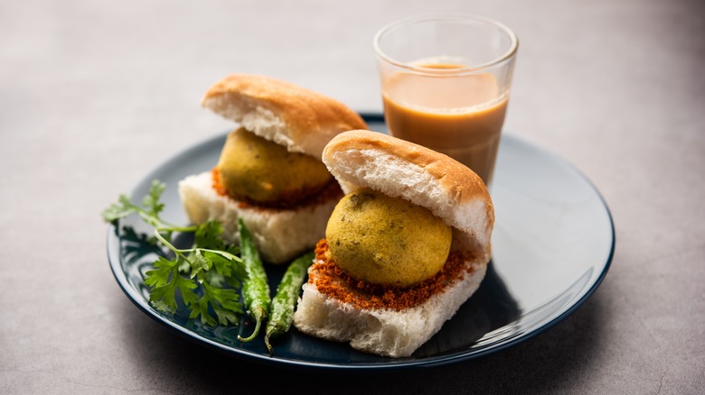 Vada pav with a glass of chai