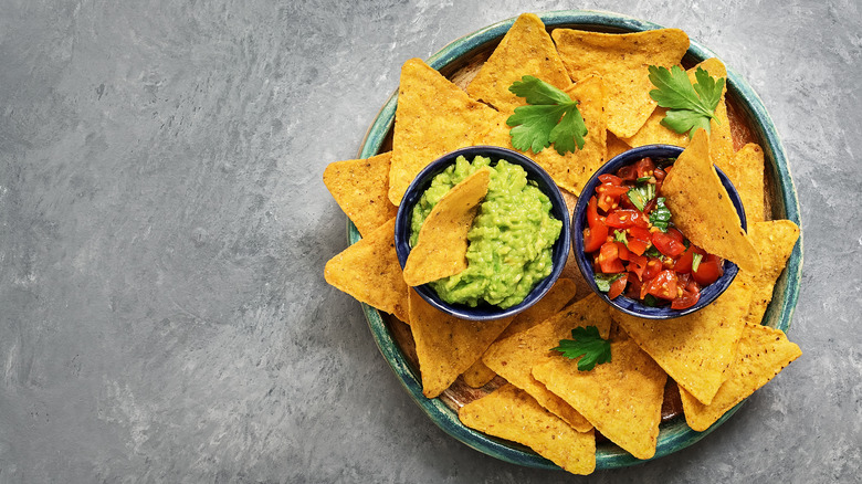 salsa and guacamole with chips