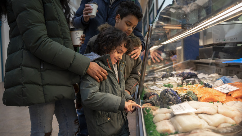 buying fish at a fish market