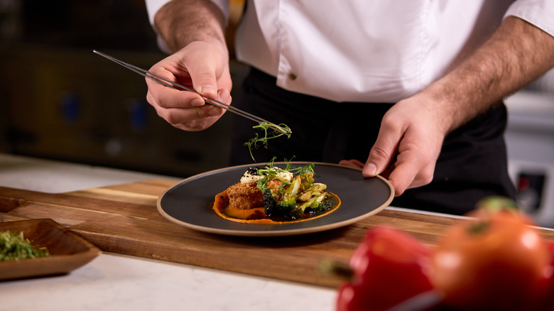 Professional chef preparing a meal 