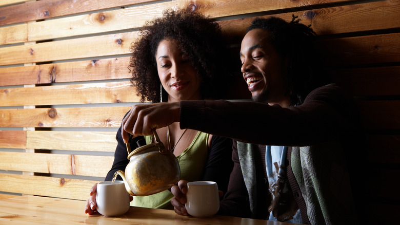 Couple drinking tea together