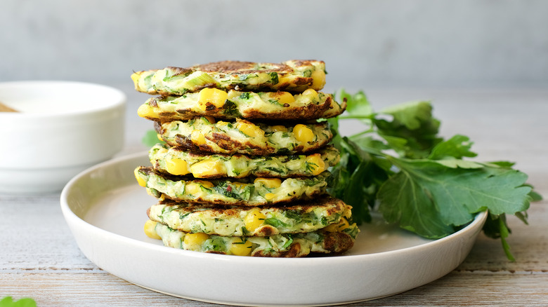 Corn fritters with greens