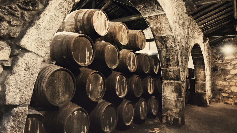 Wine barrels stored in cellar 