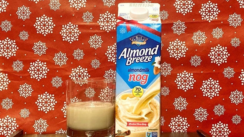 Almond Breeze almondmilk nog carton and glass