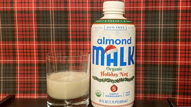 almond MALK holiday nog bottle and glass