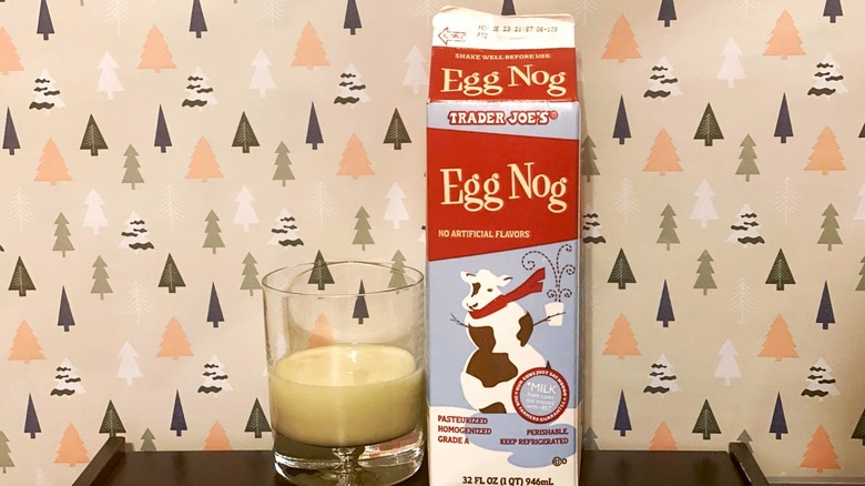 Trader Joe's egg nog carton and glass