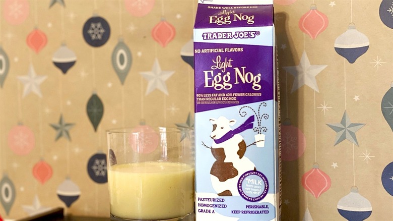 Trader Joe's light egg nog carton and glass