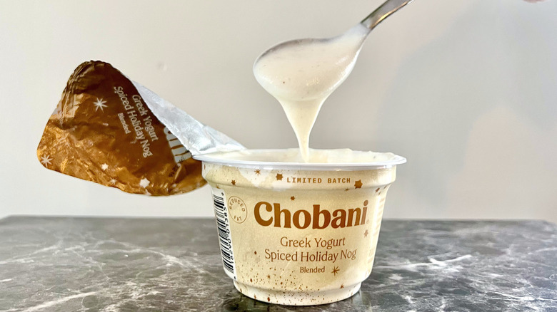 spoon dripping chobani yogurt