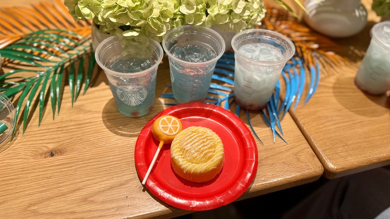 table with drinks and treats