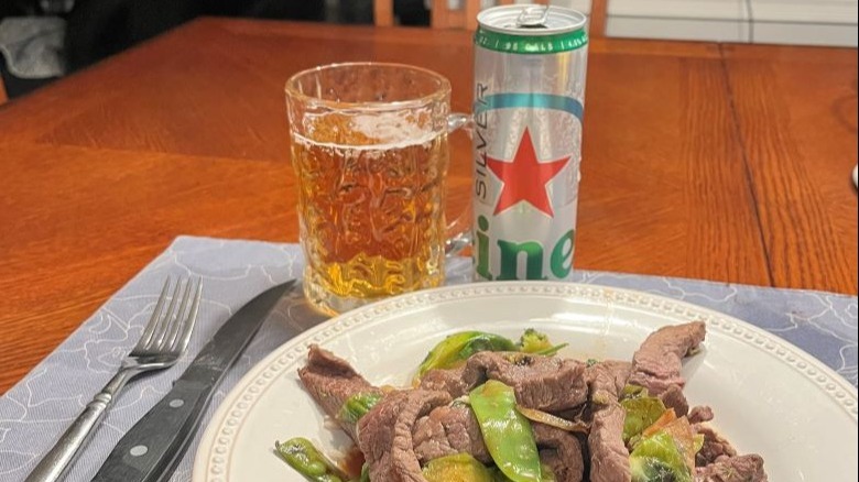 Heineken Silver beside meal