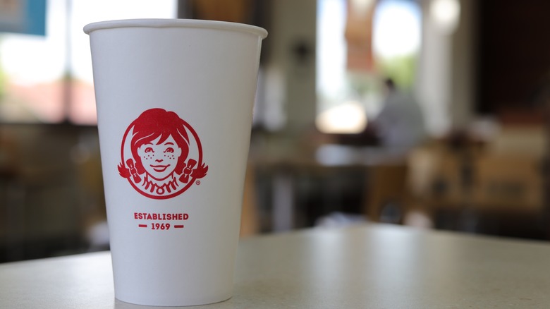 Wendy's cup on table