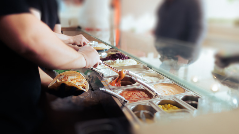 Chef preparing shawarma sandwich