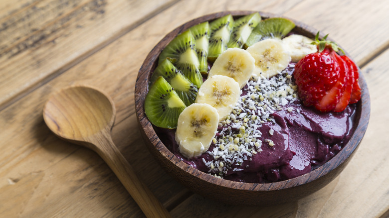 Acai bowl in wooden bowl