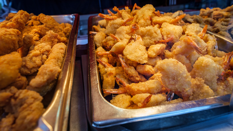 Buffet trays of fried food