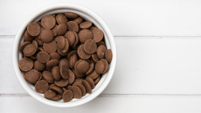 Bowl of brown candy melts