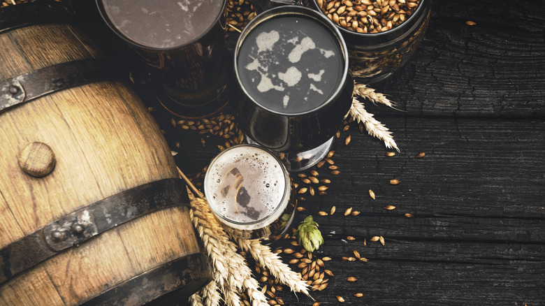 overhead shot of beer with hops and barley 