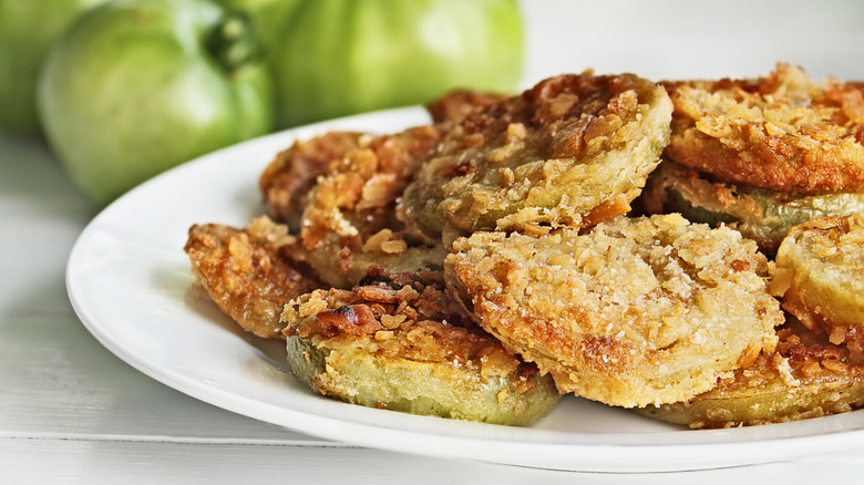 Plate of crispy fried green tomato slices