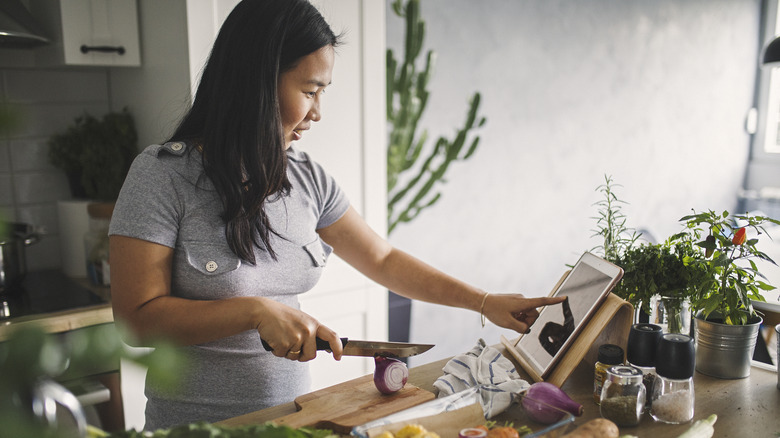 Woman cooking in kitchen