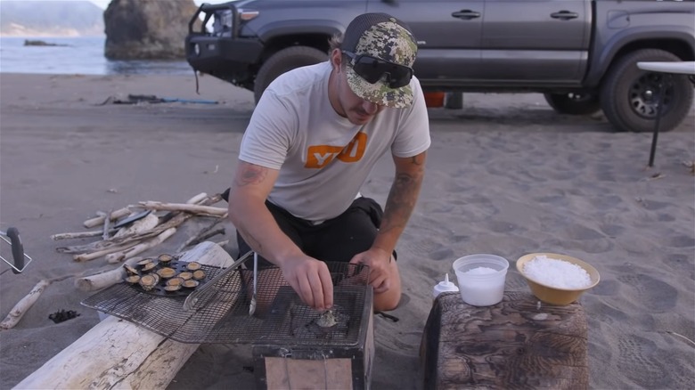 Jacob Harth barbecuing limpets 