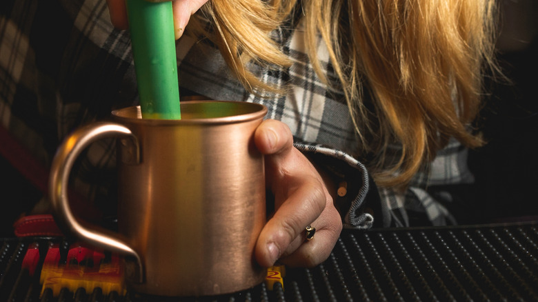 bartender making mule