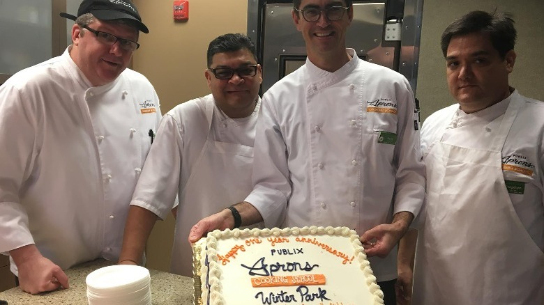 Publix chefs with cake