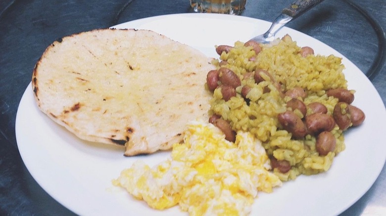 Colombian rice and beans with bread and scrambled egg