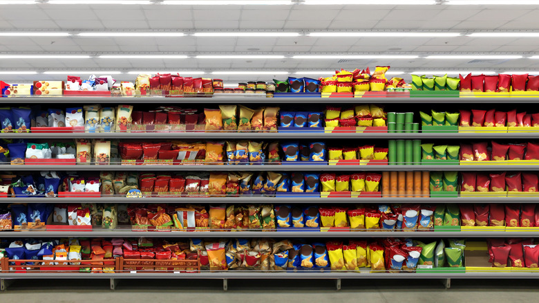 Store shelves with packaged snacks