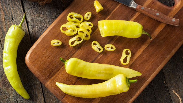 Banana peppers on cutting board