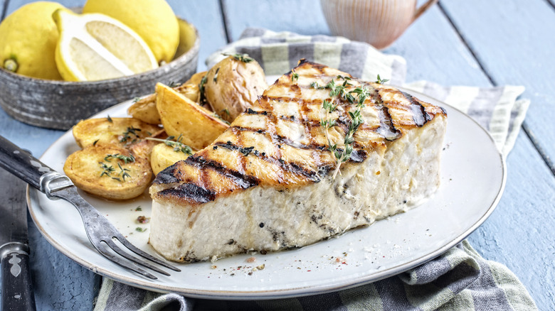 swordfish on white plate