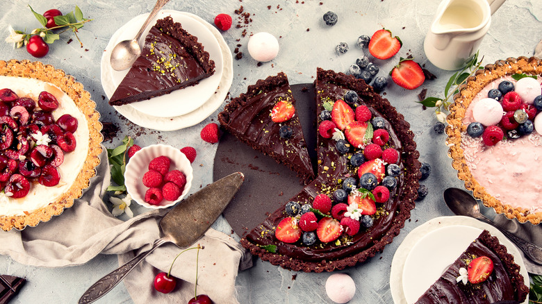 dessert table with varies pies