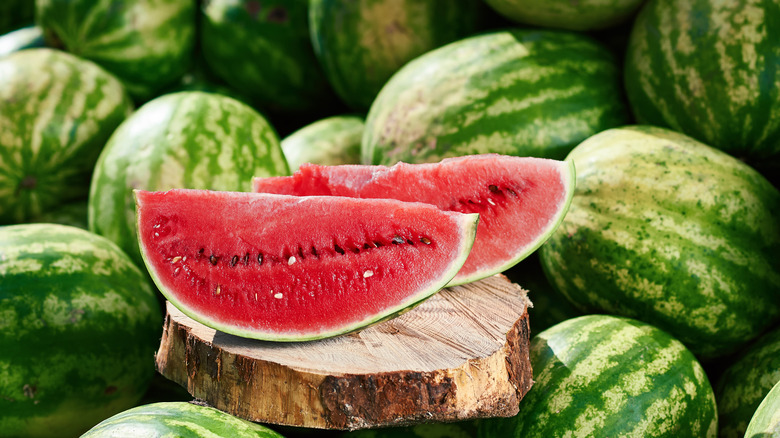 Sliced watermelon on wood