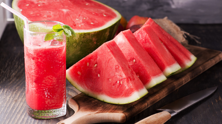 Sliced watermelon with a drink