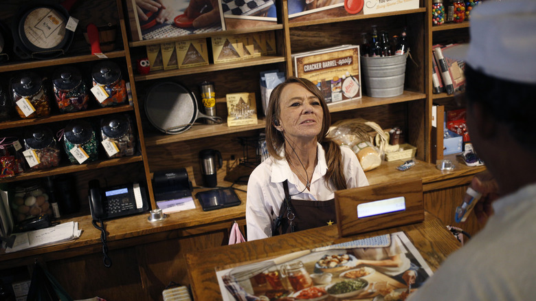 Cracker Barrel cashier serving customer