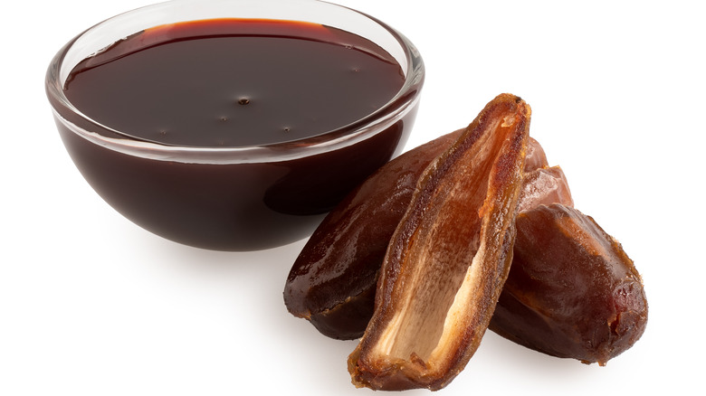 Dates and bowl of date syrup