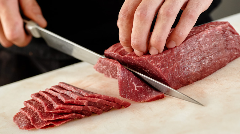 slicing beef against the grain