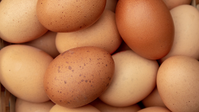Basket of speckled hen eggs 