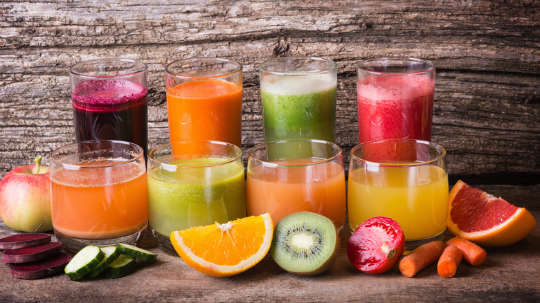 glasses of fresh squeezed juice on table