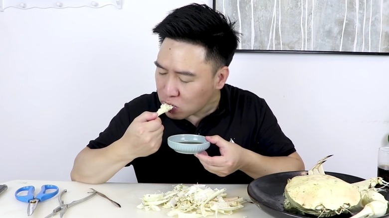 Man eating crystal crab