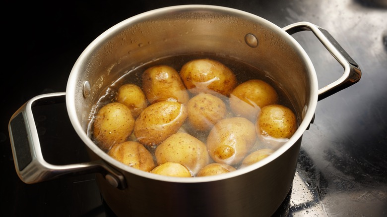 Potatoes boiling in water