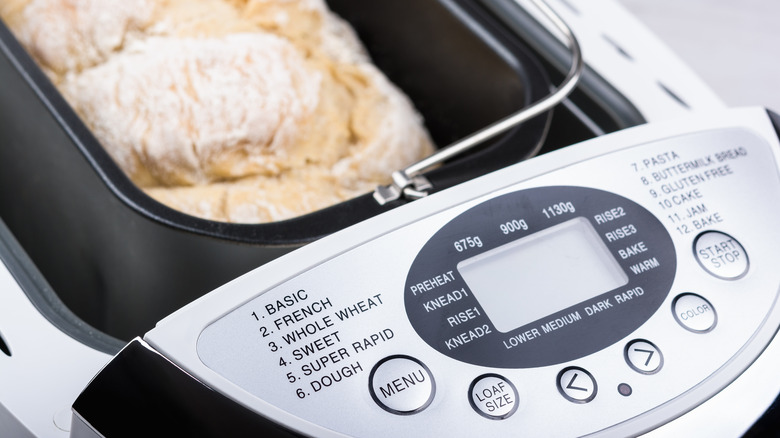 Open bread maker with bread inside