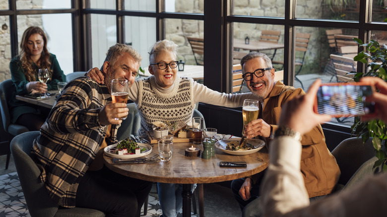 customers taking photo in gastropub