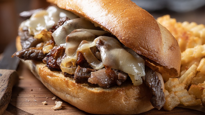 cheesesteak with fries close up